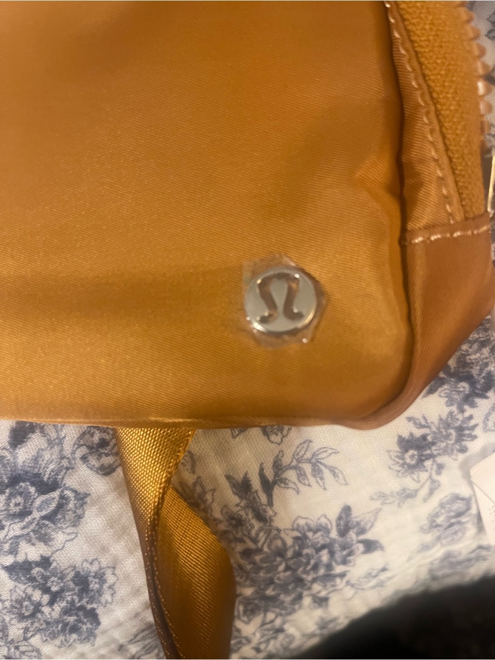 lululemon Everywhere belt bag featuring a caramel brown color